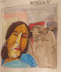 Frau und Hund beim MIttagsschlaf